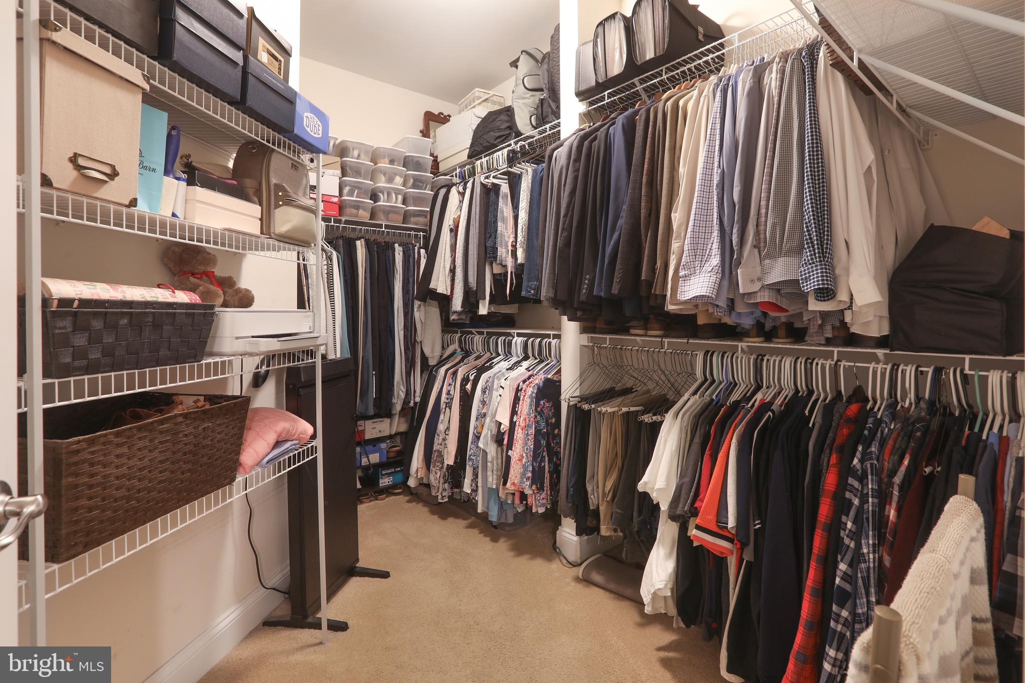1843 Exton Drive, Unit 197 Fallston, MD 21047 - Photo 32 of 68 a view of walk in closet with clothes and shoes