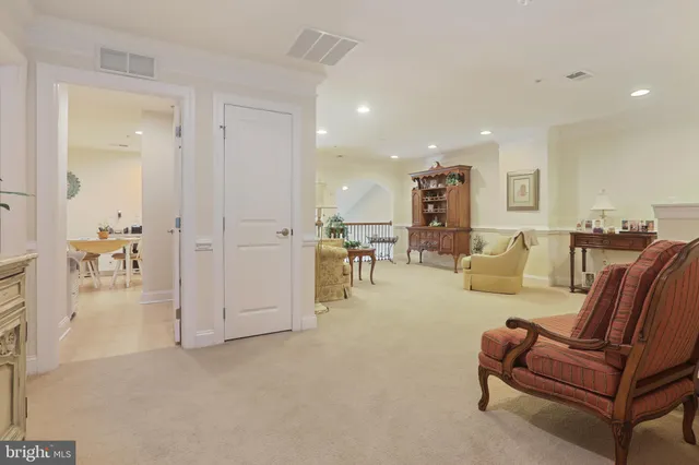 a kitchen with stainless steel appliances kitchen island granite countertop a sink and cabinets
