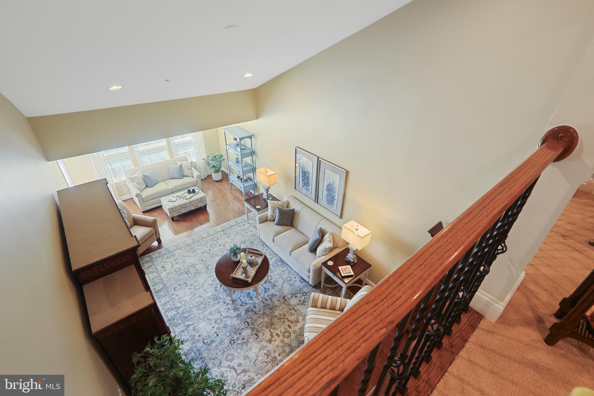 1843 Exton Drive, Unit 197 Fallston, MD 21047 - Photo 38 of 68 a living room with furniture and a wooden floor