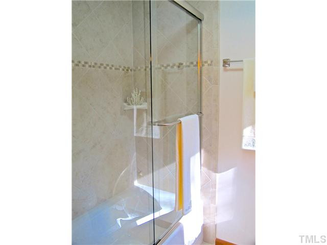 8521 Kempton Road Raleigh, NC 27615 - Photo 13 of 25 Beautiful tile in the Master shower
