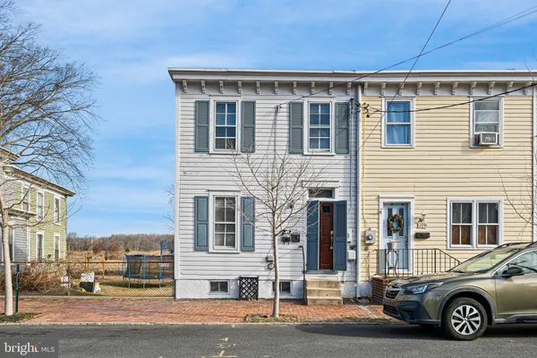 a car parked in front of a house
