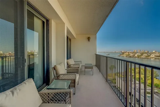a view of a hallway with seating area
