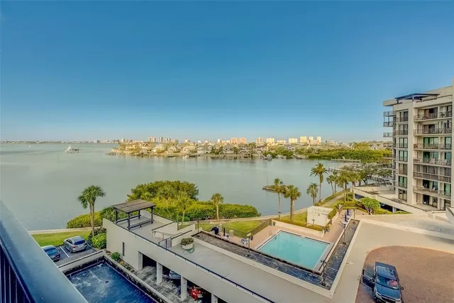 a view of a dining table and chairs in the patio