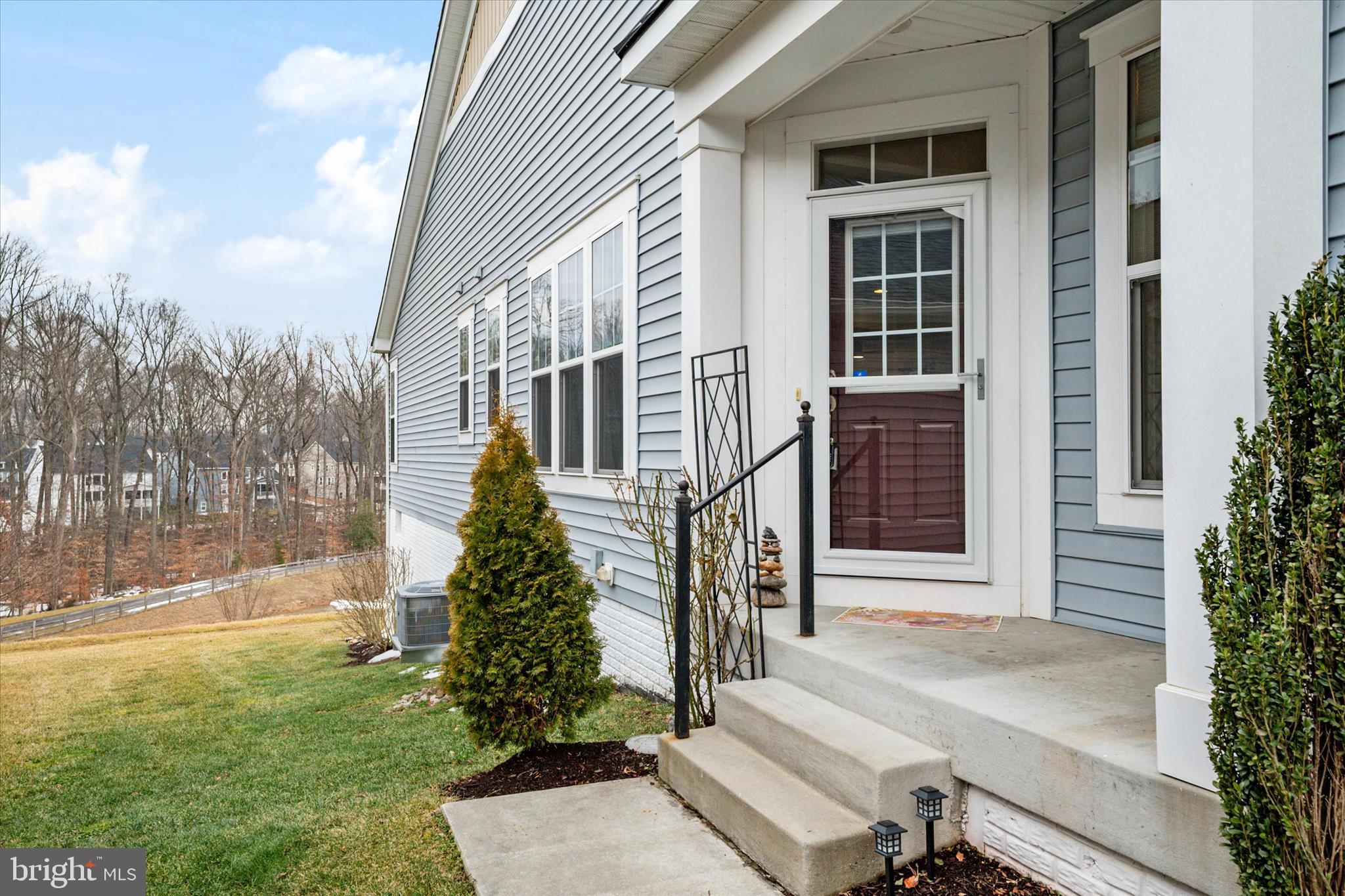2705 Dragon Fly Way Odenton, MD 21113 - Photo 12 of 79 front view of a house with a yard