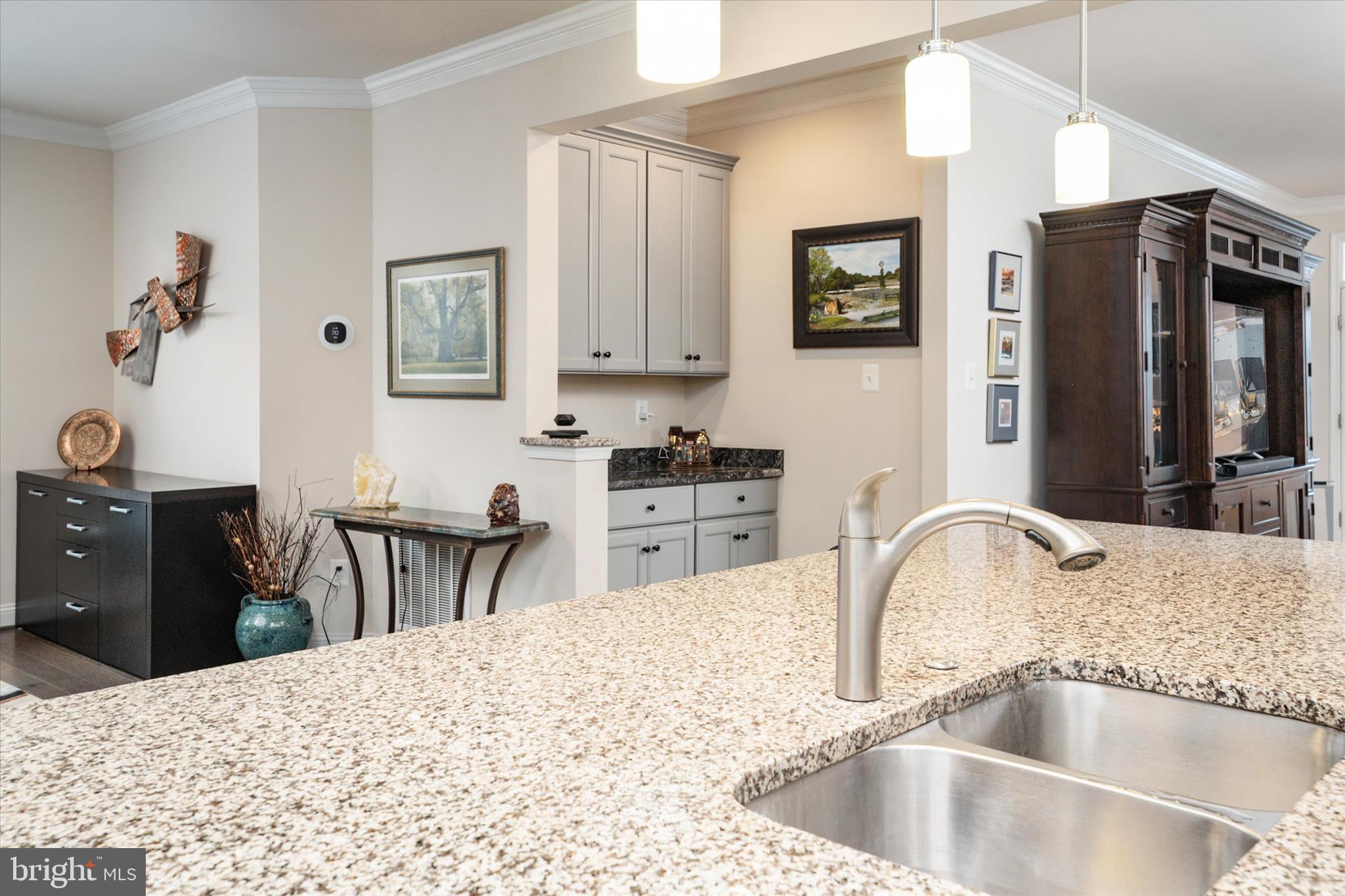 2705 Dragon Fly Way Odenton, MD 21113 - Photo 20 of 79 a kitchen with kitchen island a counter top space appliances and cabinets