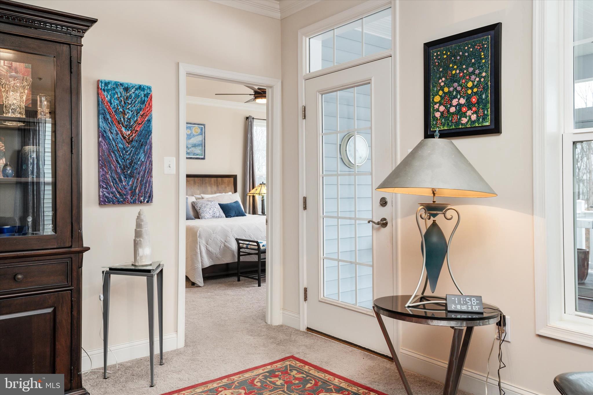 2705 Dragon Fly Way Odenton, MD 21113 - Photo 23 of 79 a view of a hallway with paintings on the wall