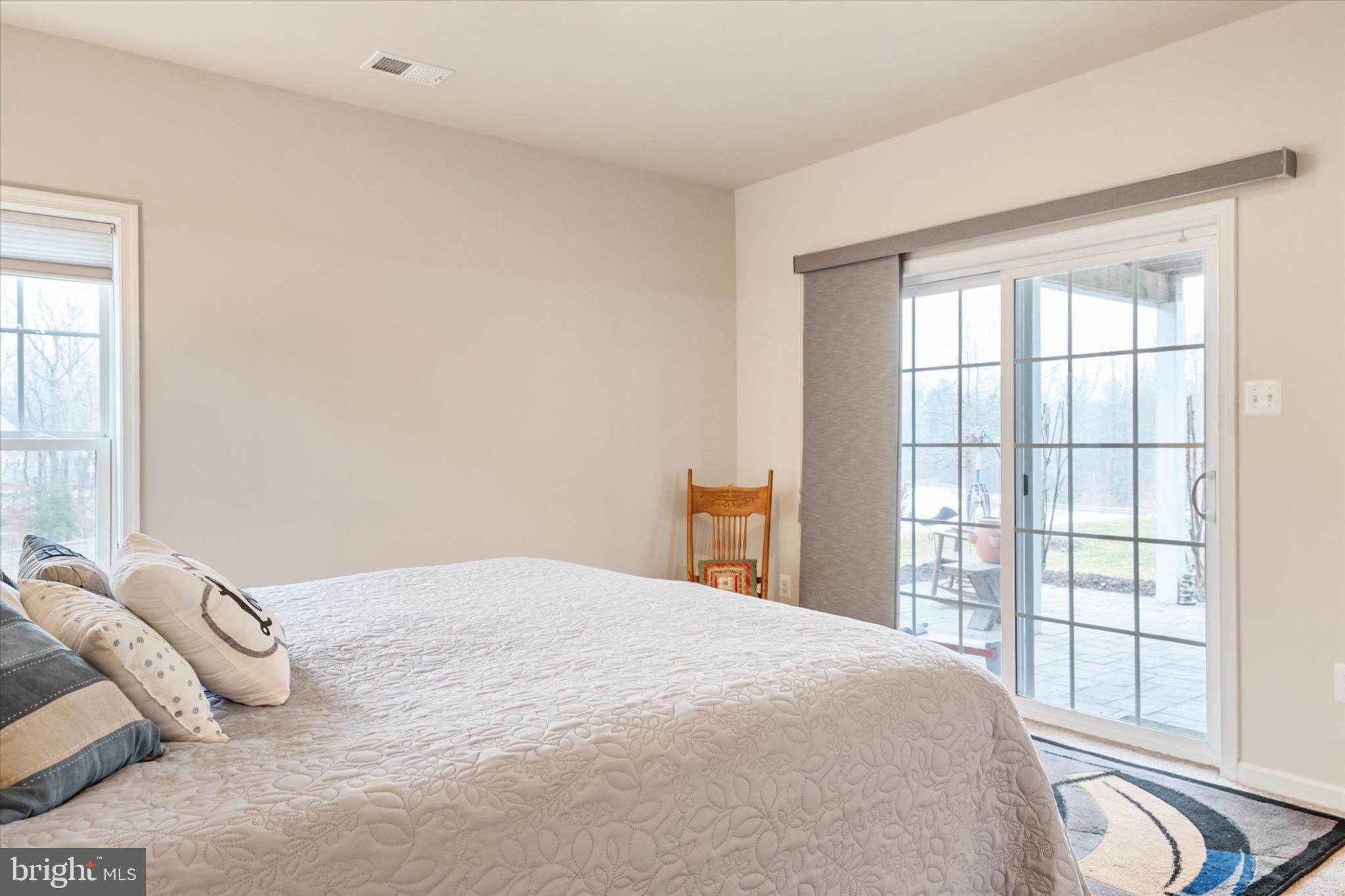 2705 Dragon Fly Way Odenton, MD 21113 - Photo 39 of 79 a bedroom with a bed and a large window