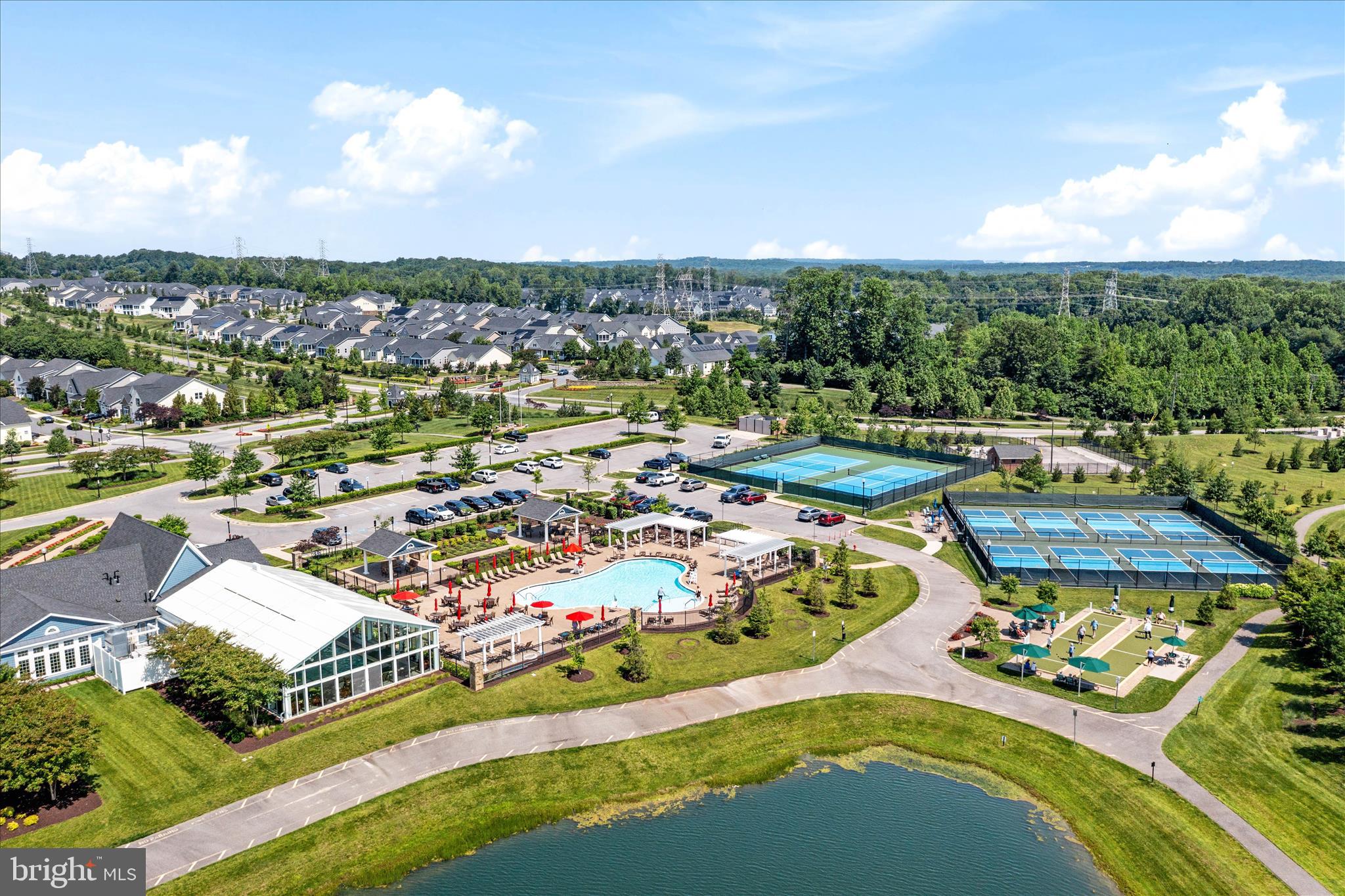 2705 Dragon Fly Way Odenton, MD 21113 - Photo 77 of 79 an aerial view of a city with lots of residential buildings ocean and mountain view in back