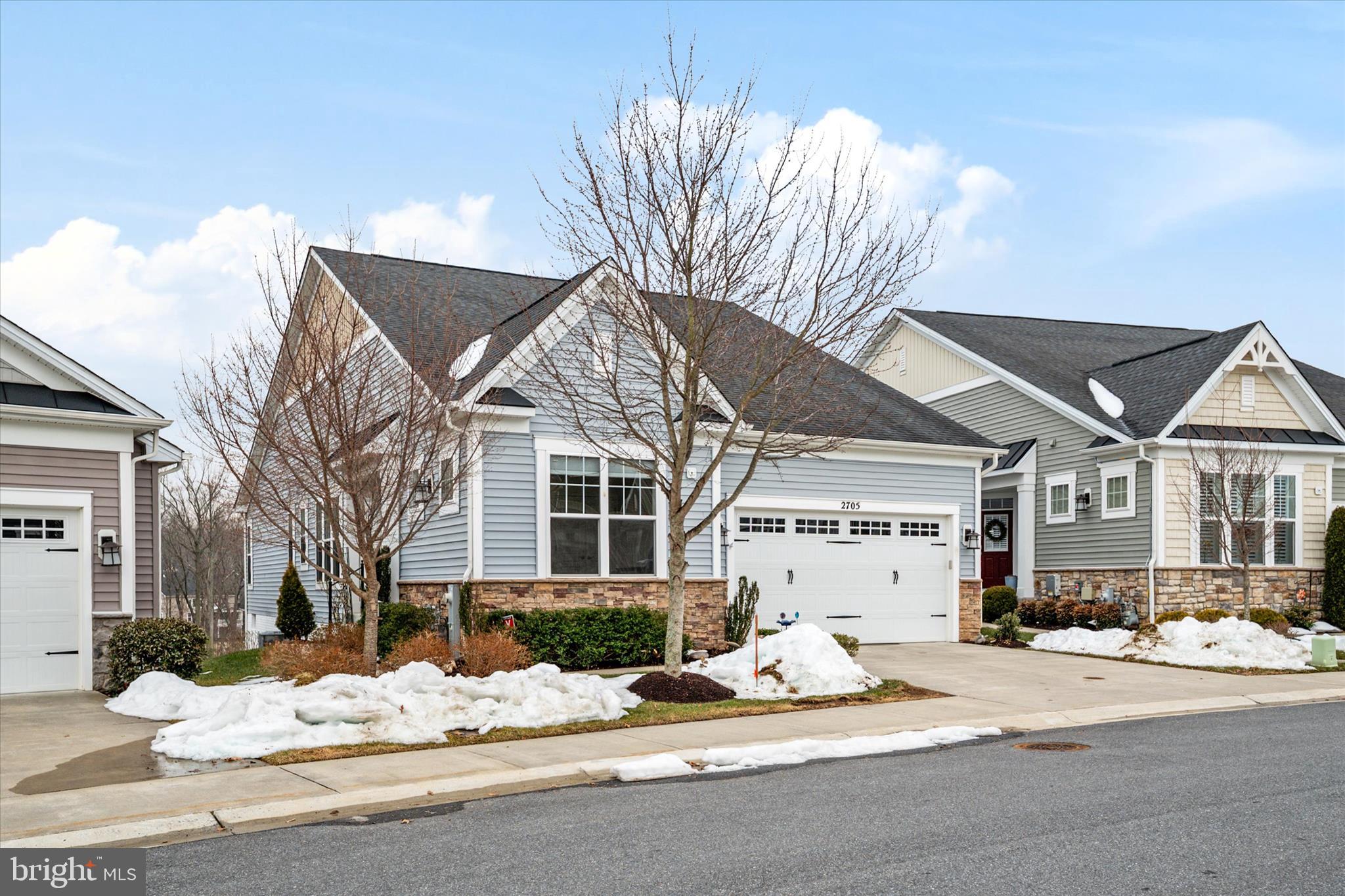 2705 Dragon Fly Way Odenton, MD 21113 - Photo 10 of 79 a view of white house with a snow on the road