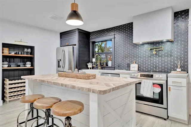 a bedroom with a bed and a desk