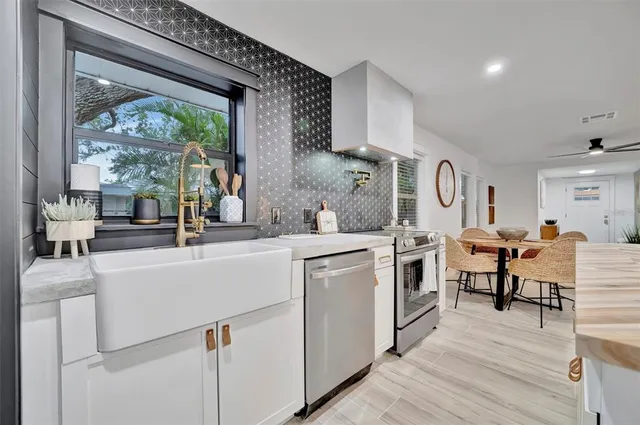 a view of backyard with a garden and plants