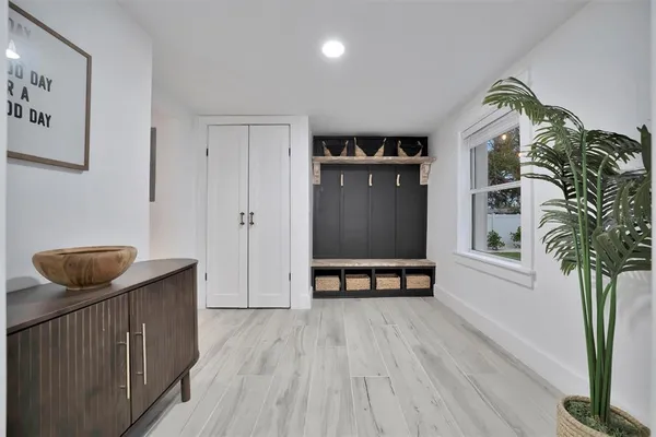 a living room with a couch and a flat screen tv