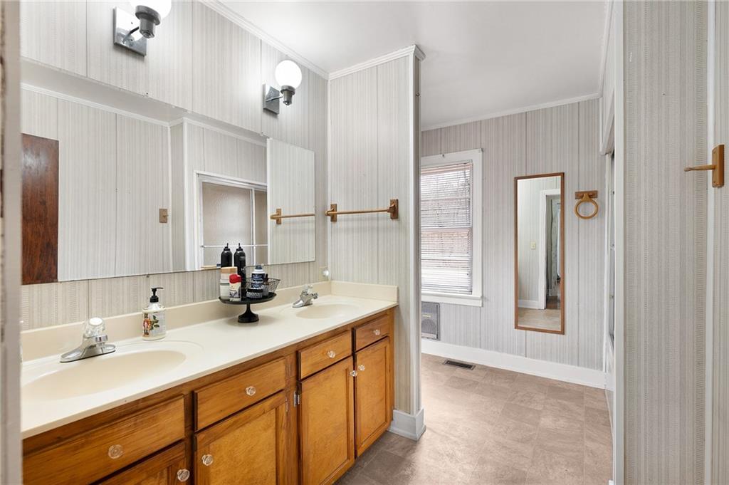 1340 Hyden Tyler Road Chatsworth, GA 30705 - Photo 18 of 65 a spacious bathroom with a double vanity sink mirror and double
