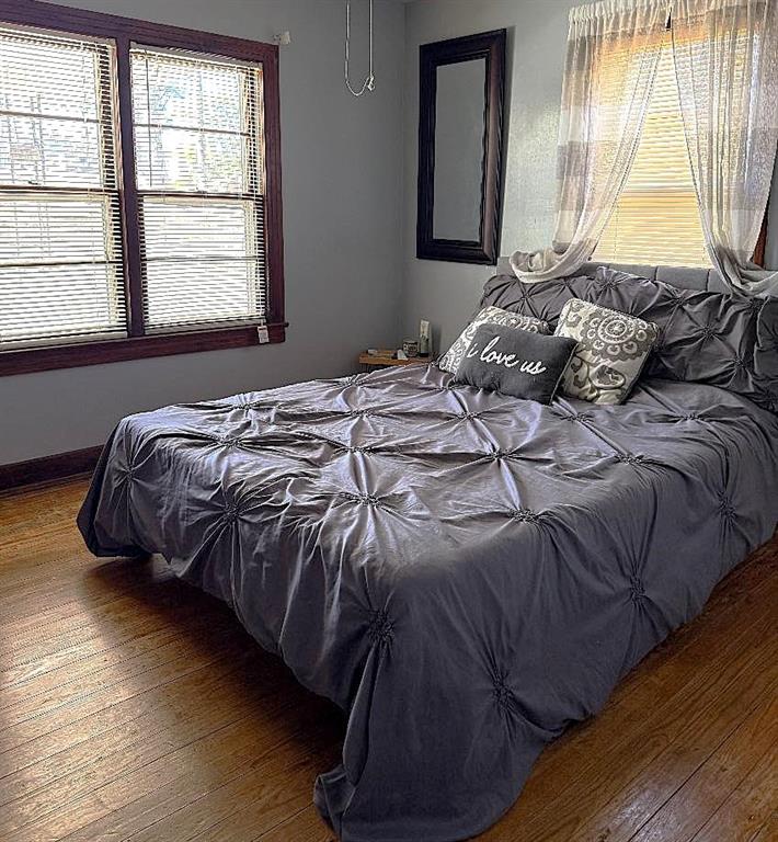 1340 Hyden Tyler Road Chatsworth, GA 30705 - Photo 55 of 65 a bedroom with a bed and a window