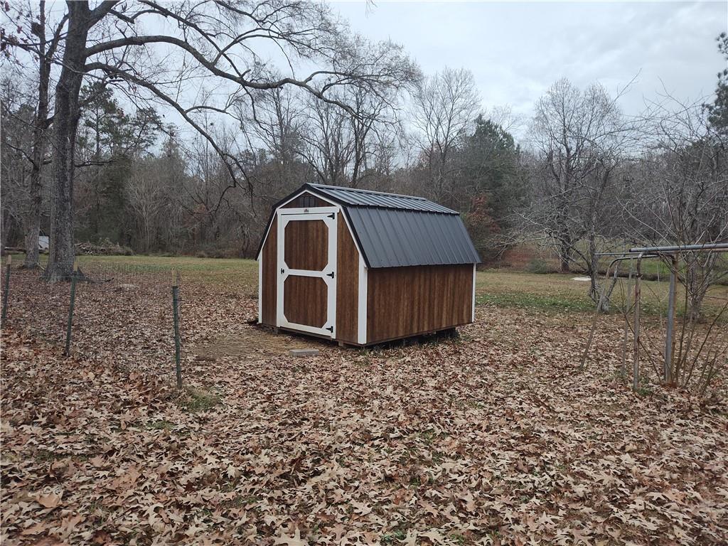 1340 Hyden Tyler Road Chatsworth, GA 30705 - Photo 60 of 65 a view of backyard with tree