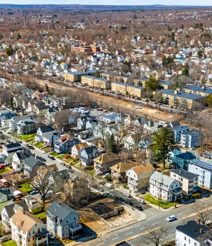 an aerial view of a city with lots of residential buildings