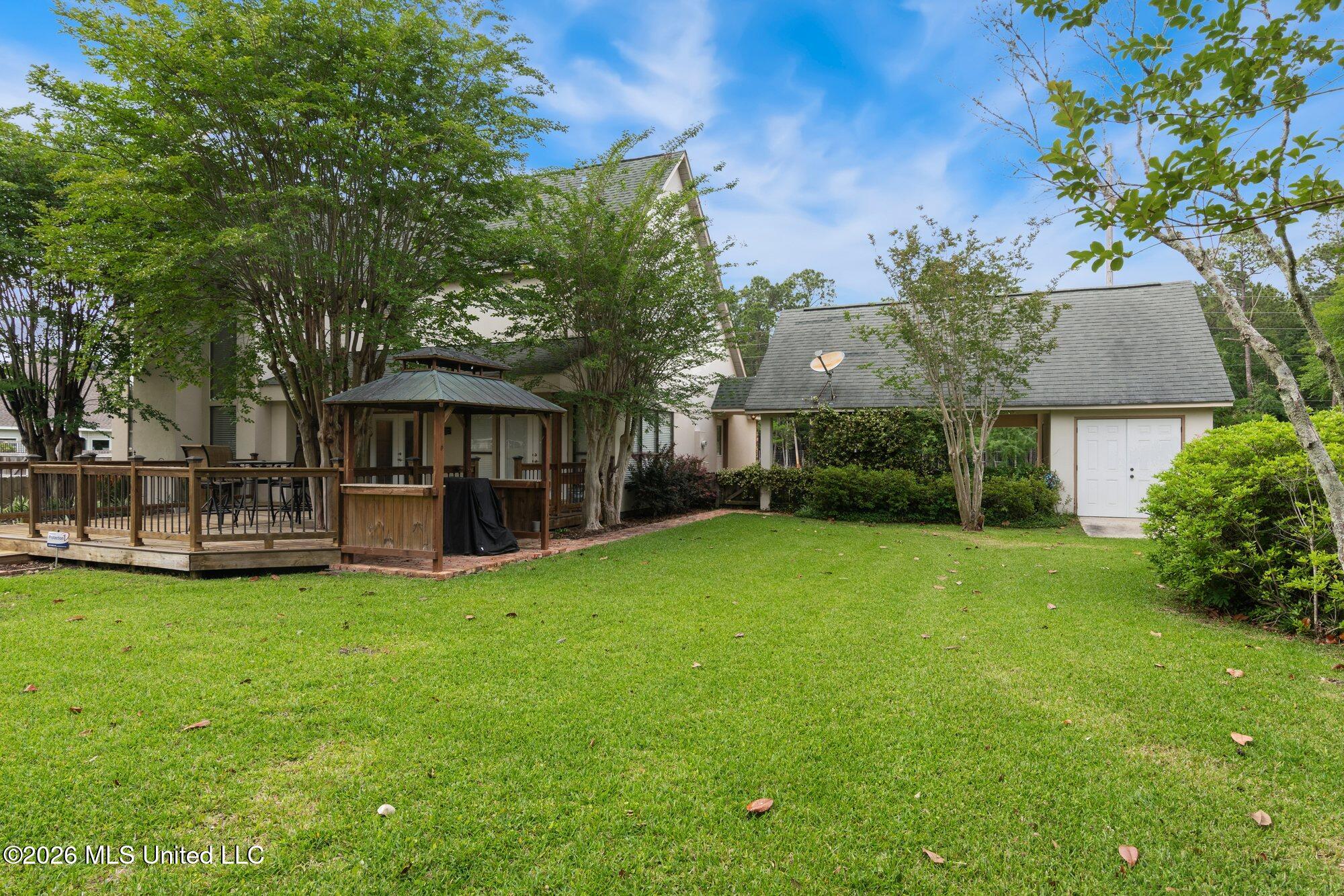 18029 Commission Road Long Beach, MS 39560 - Photo 30 of 34 Side yard