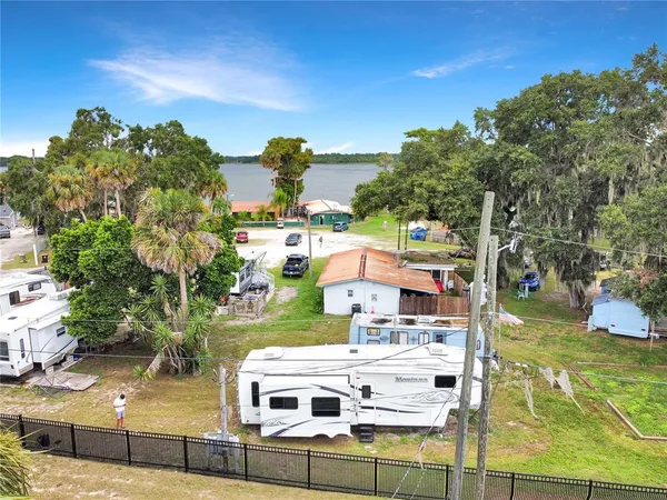 a aerial view of a house with outdoor space