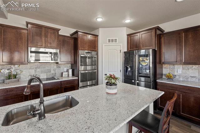 8644 Vanderwood Road Colorado Springs, CO 80908 - Photo 7 of 43 Granite countertops