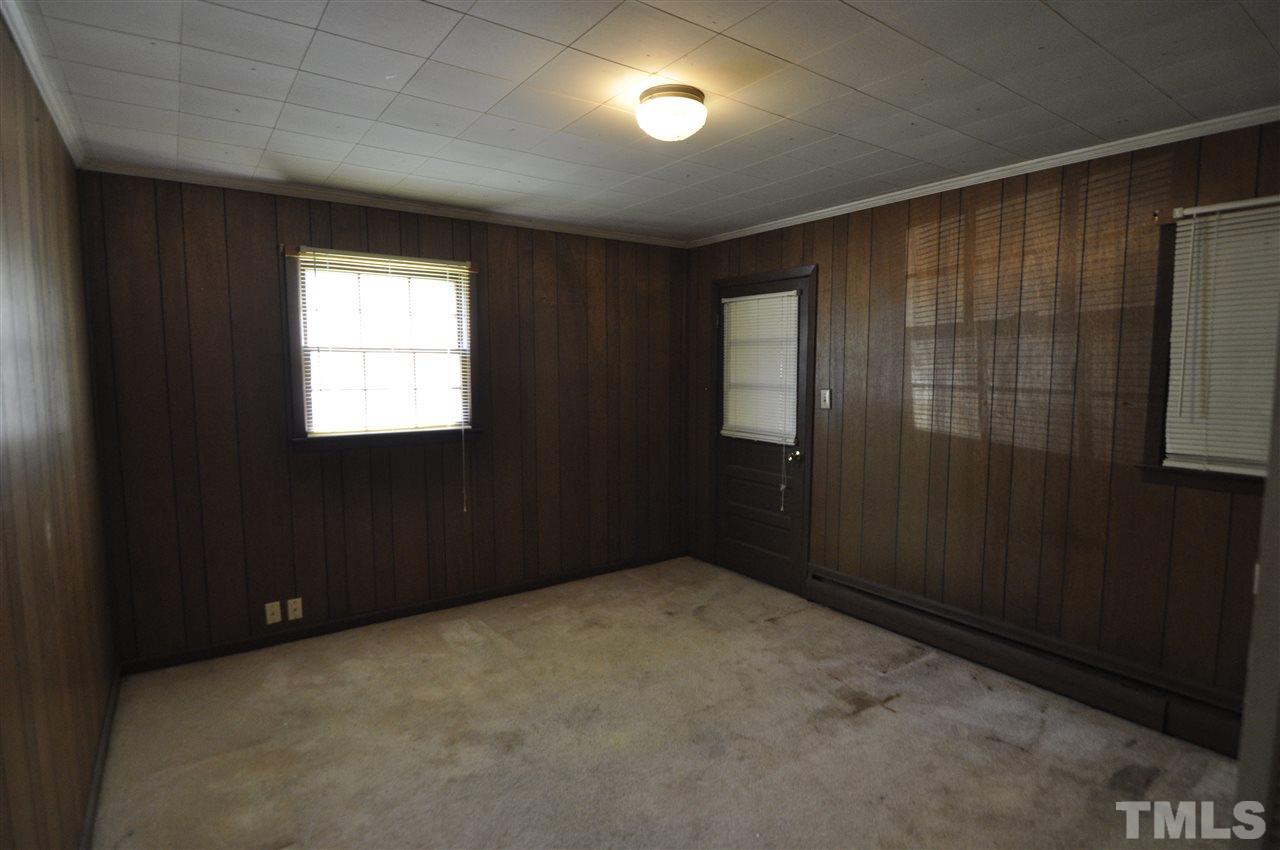 532 Princeton Street Raleigh, NC 27609 - Photo 11 of 19 a view of an empty room with a window