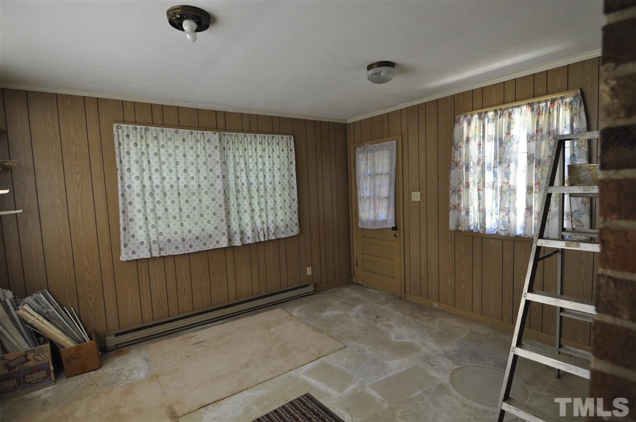 532 Princeton Street Raleigh, NC 27609 - Photo 13 of 19 a view of an empty room with a window