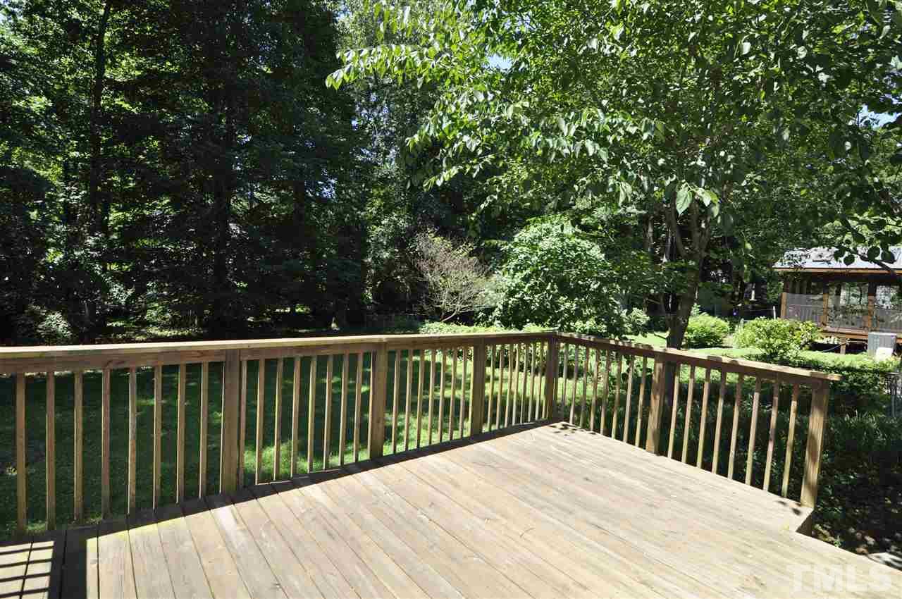 532 Princeton Street Raleigh, NC 27609 - Photo 19 of 19 a balcony with wooden floor and fence
