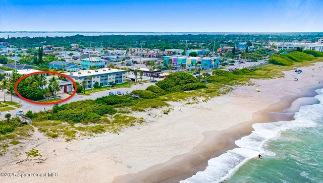 a chair and table in front of a window