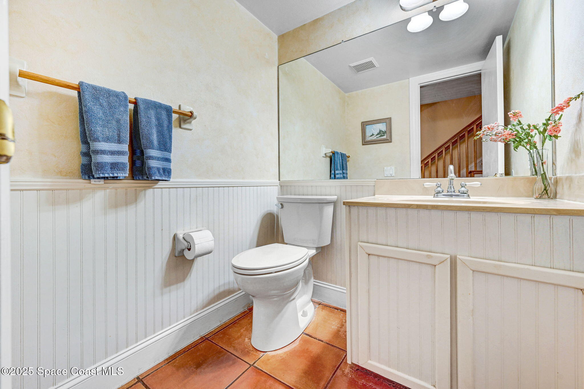 312 Wave Crest Avenue Indialantic, FL 32903 - Photo 27 of 62 a bathroom with a sink and a mirror