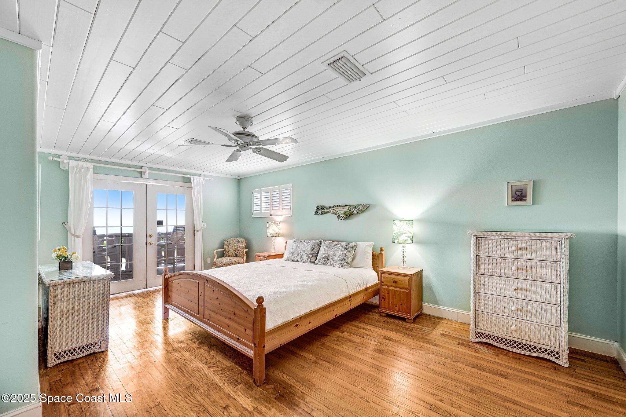 312 Wave Crest Avenue Indialantic, FL 32903 - Photo 30 of 62 a bedroom with a bed and furniture