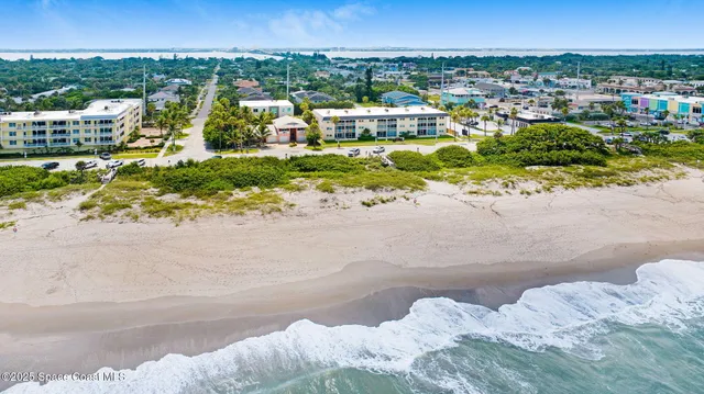 a spacious bathroom with a sink and a mirror