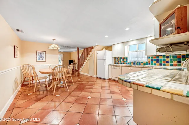 a bedroom with a bed and a table with closet