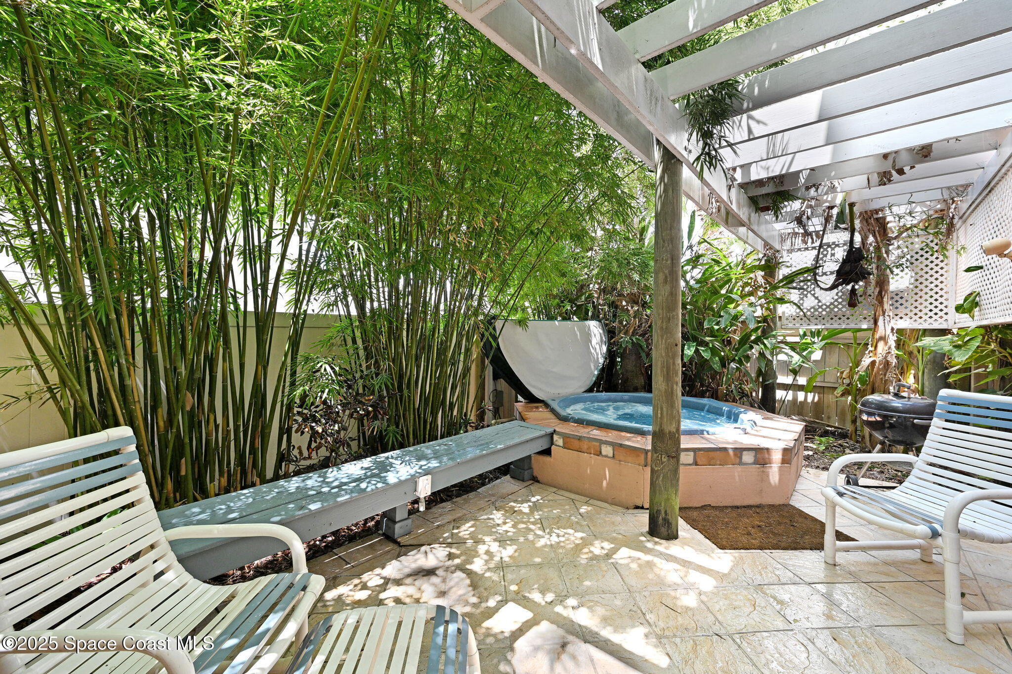 312 Wave Crest Avenue Indialantic, FL 32903 - Photo 51 of 62 a view of a chairs in a patio