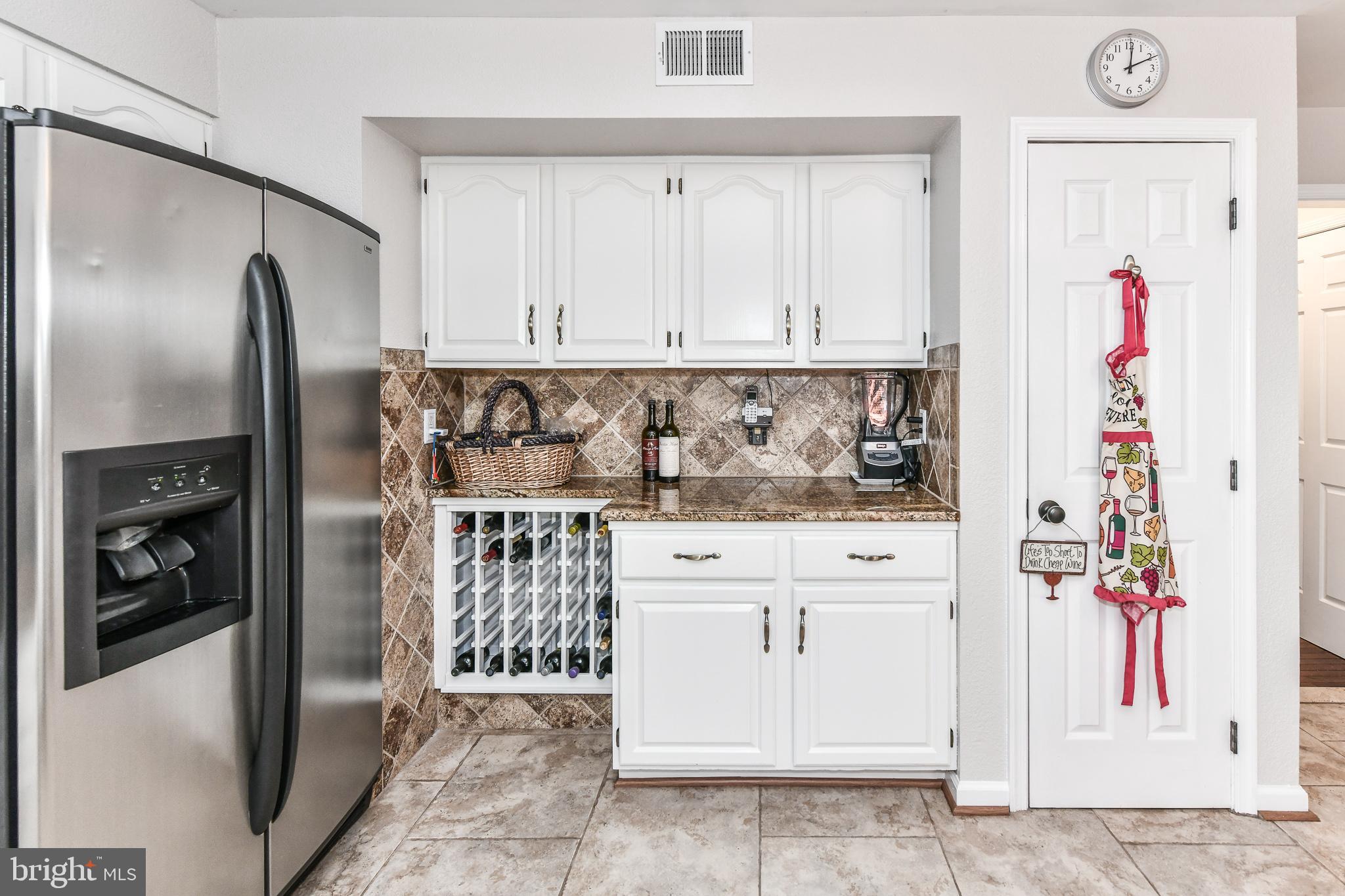111 Country Road Sterling, VA 20165 - Photo 11 of 55 Tons of storage - wine rack and pantry!