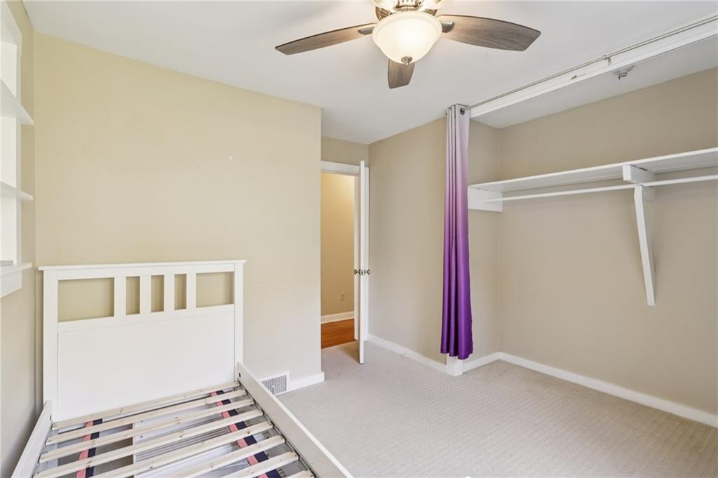 4561 School Road South Export, PA 15632 - Photo 39 of 48 a view of a room with wooden floor and fan
