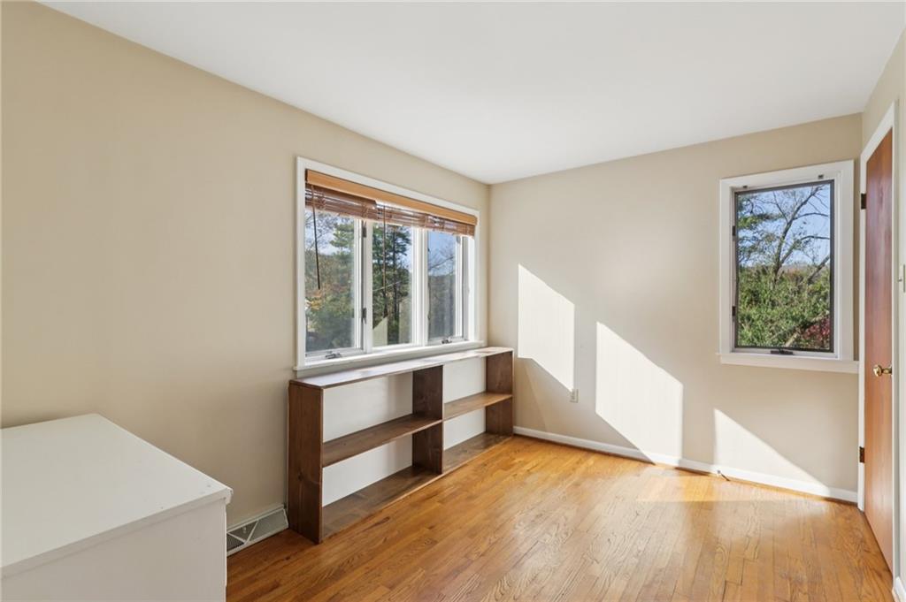 4561 School Road South Export, PA 15632 - Photo 40 of 48 a view of an empty room with wooden floor and a window