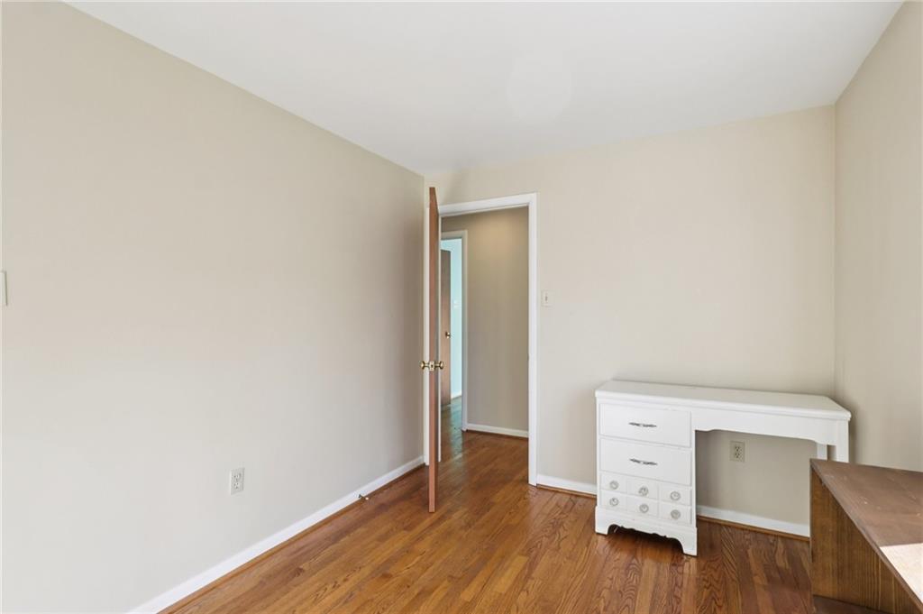 4561 School Road South Export, PA 15632 - Photo 41 of 48 a room with wooden floor and furniture