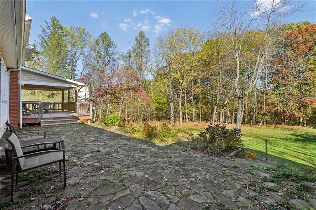 4561 School Road South Export, PA 15632 - Photo 9 of 48 a view of a backyard with pathway