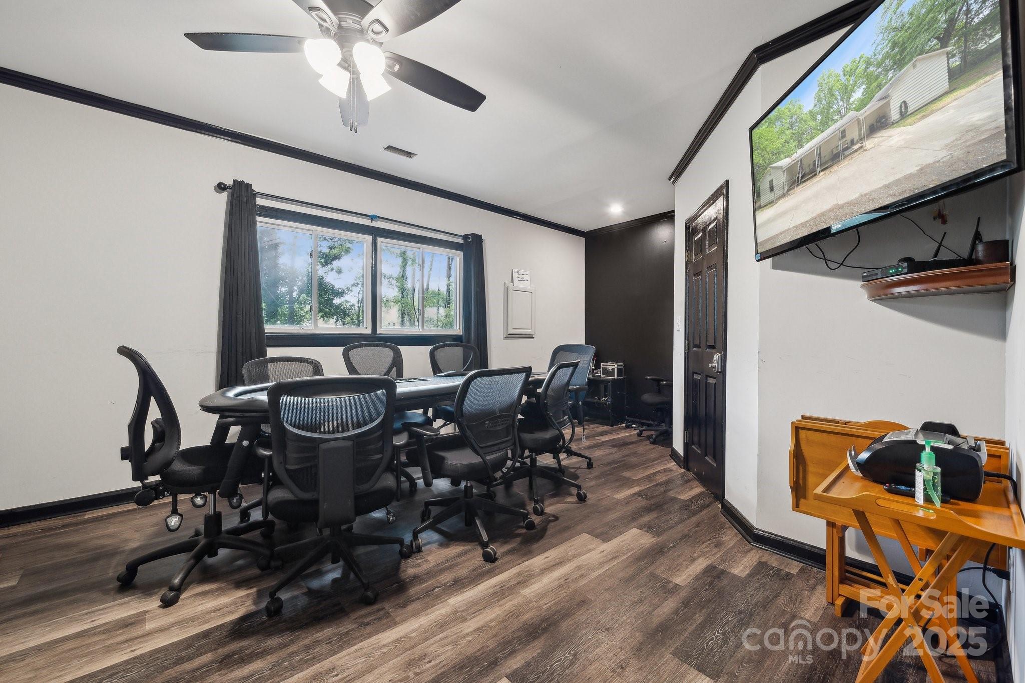 1917 Tom Sadler Road Charlotte, NC 28214 - Photo 12 of 27 a view of a dining room with furniture window and wooden floor