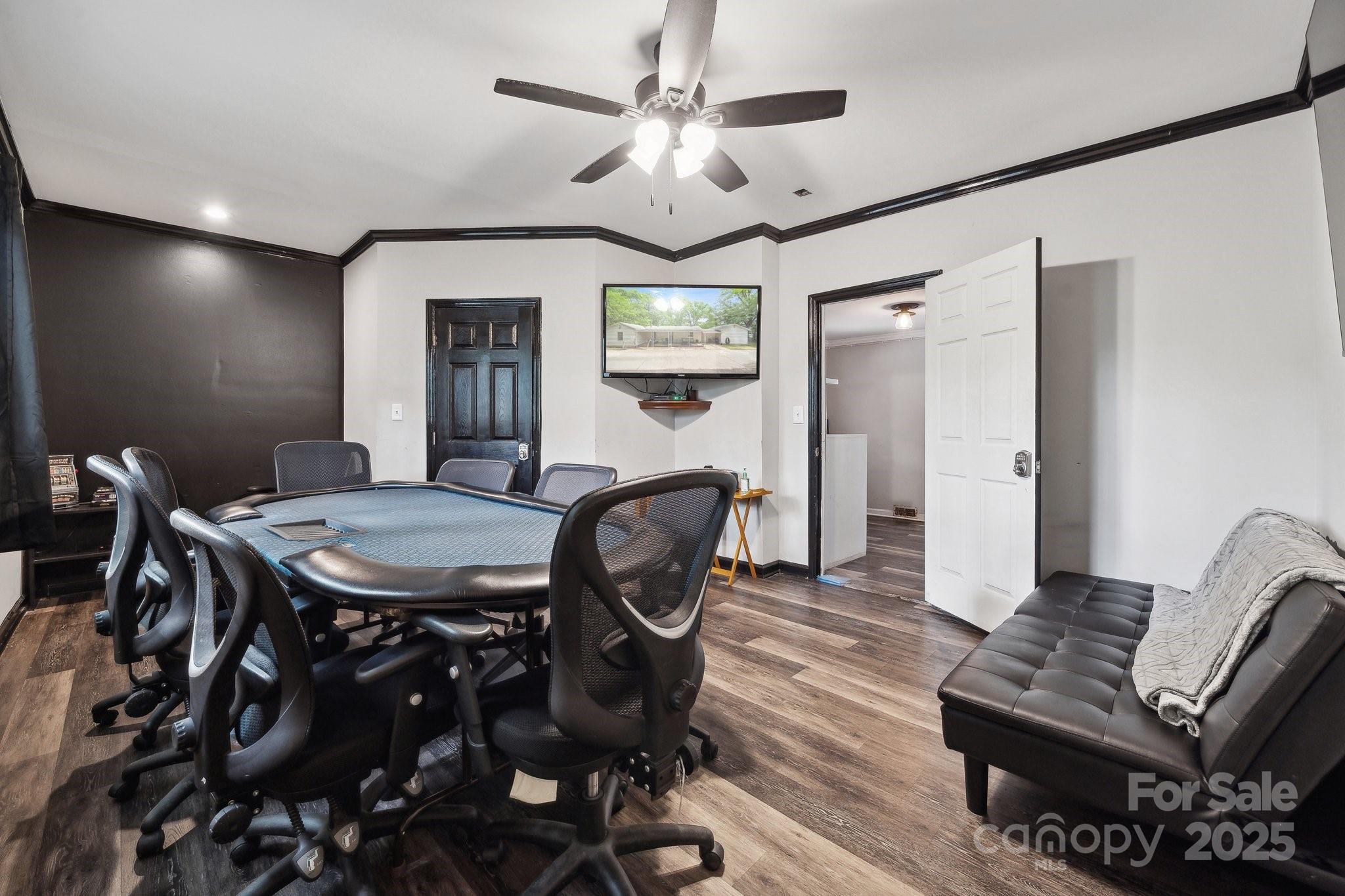 1917 Tom Sadler Road Charlotte, NC 28214 - Photo 13 of 27 a view of a livingroom with furniture and a dining table