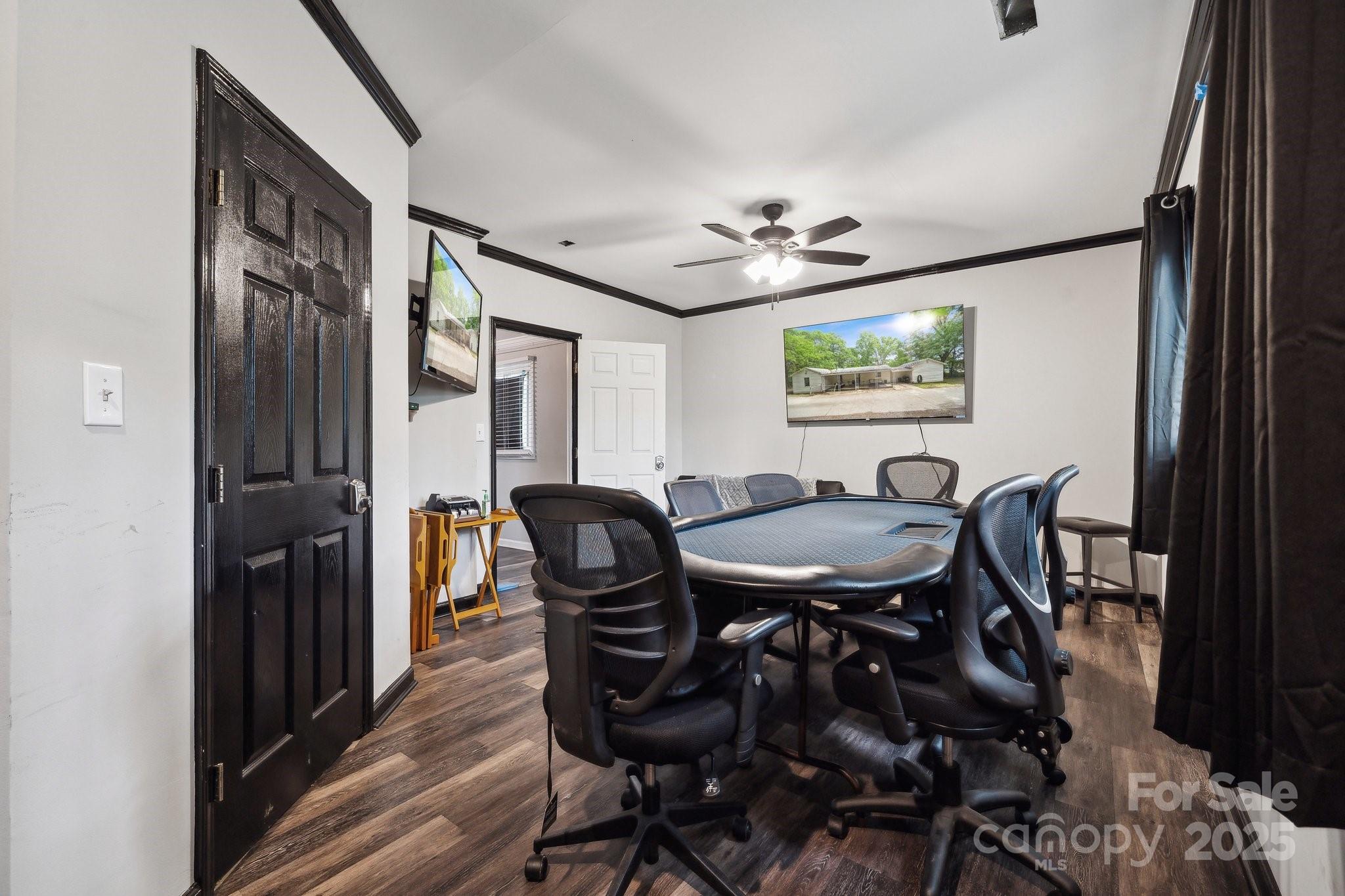 1917 Tom Sadler Road Charlotte, NC 28214 - Photo 14 of 27 a view of a a dining room with furniture window and wooden floor