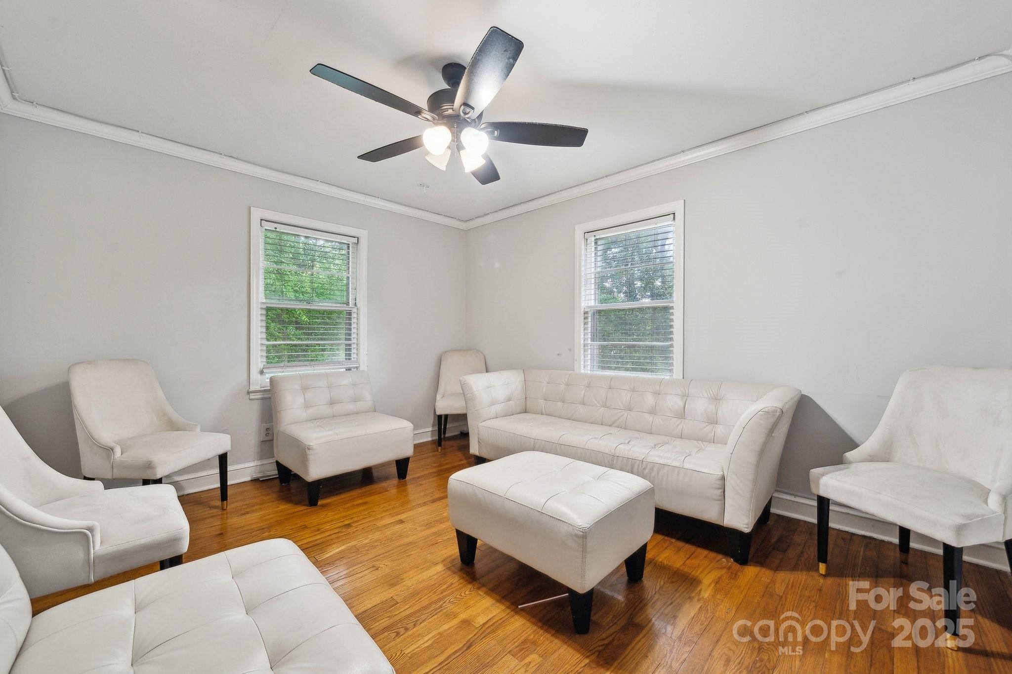 1917 Tom Sadler Road Charlotte, NC 28214 - Photo 17 of 27 a living room with furniture and a window