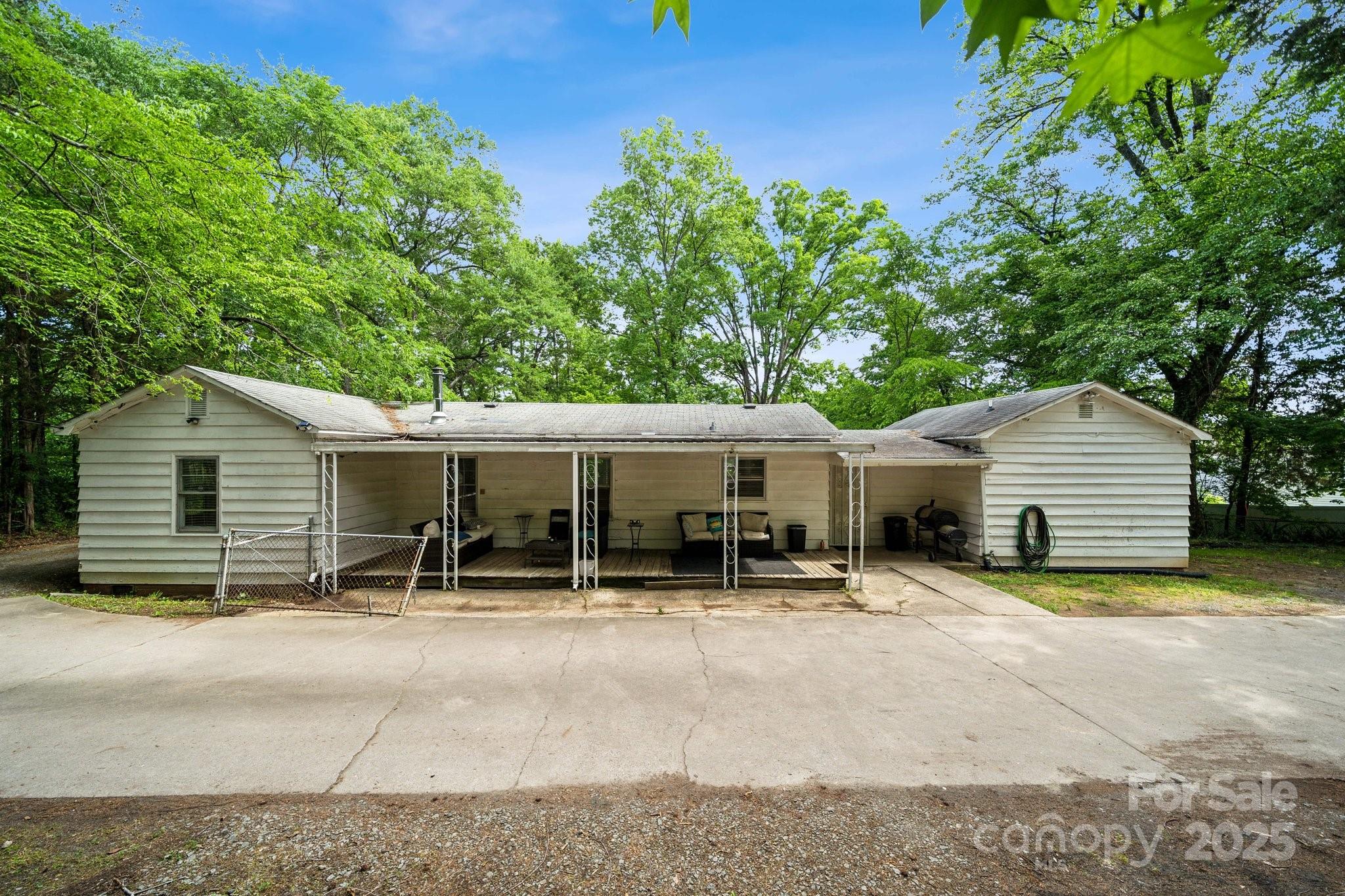 1917 Tom Sadler Road Charlotte, NC 28214 - Photo 24 of 27 a view of a outdoor space with porch and furniture
