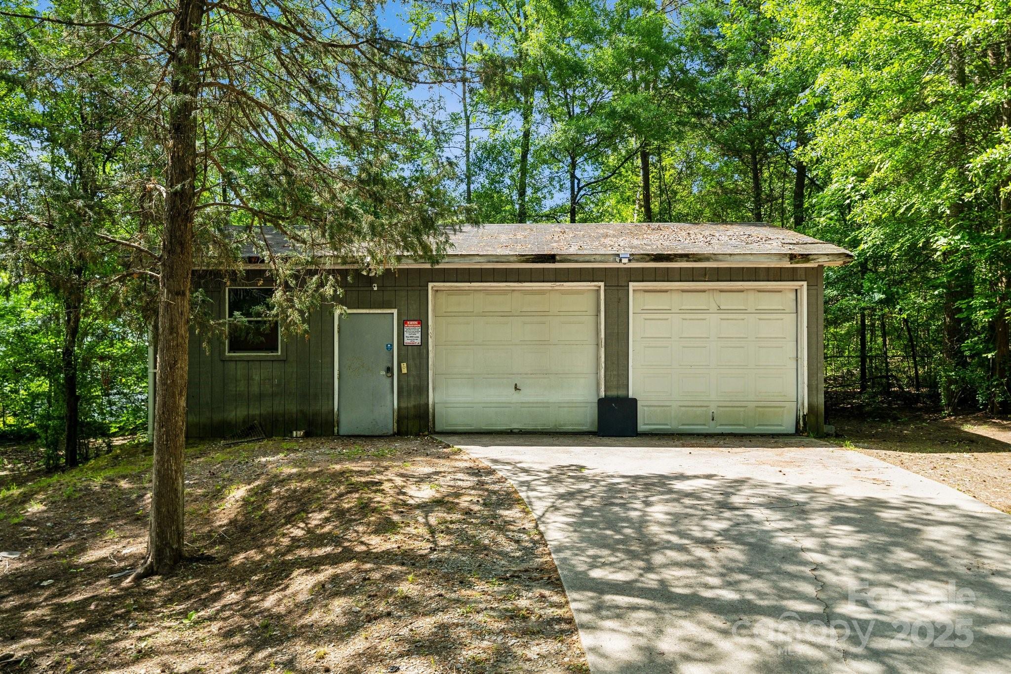 1917 Tom Sadler Road Charlotte, NC 28214 - Photo 3 of 27 a view of a backyard