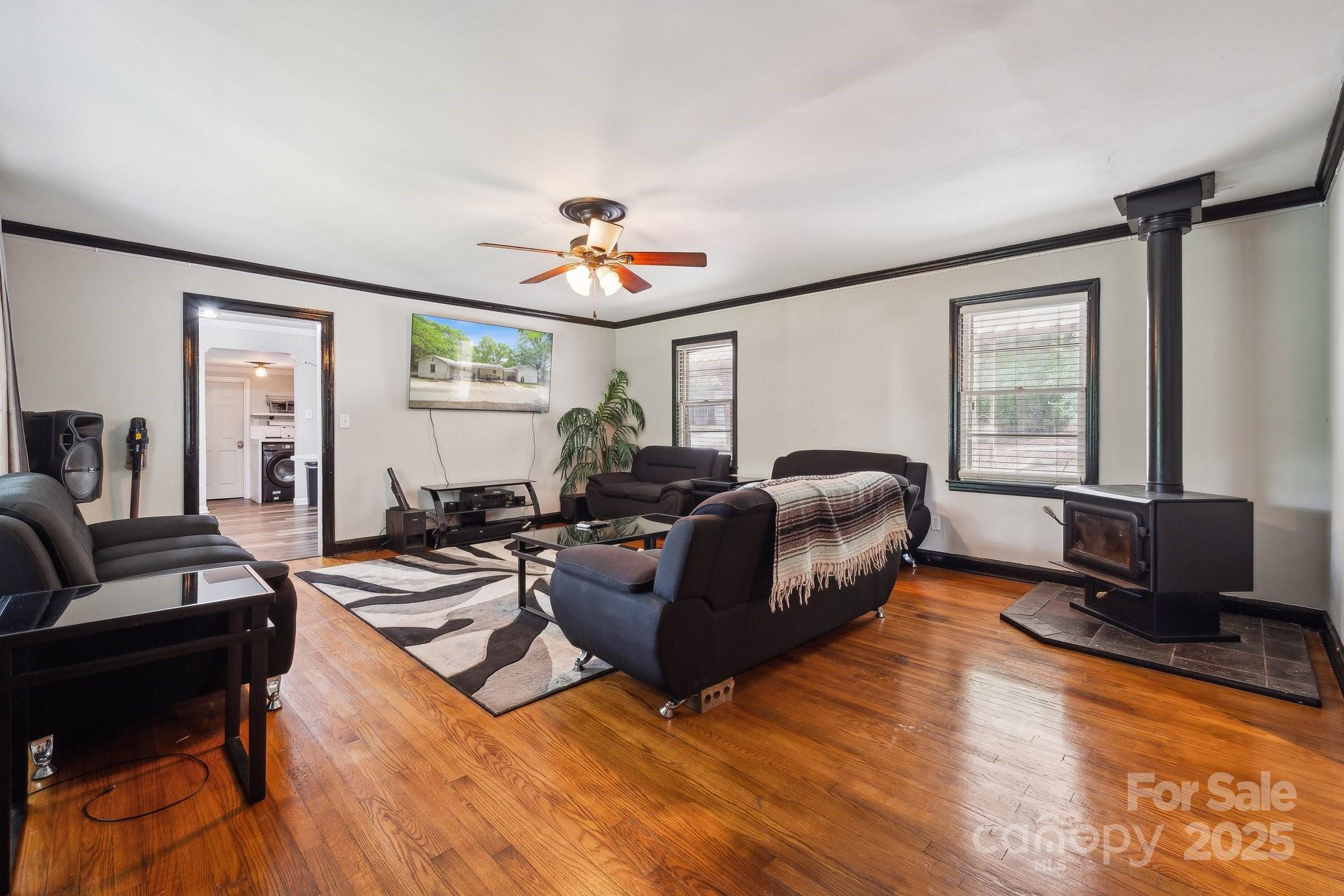 1917 Tom Sadler Road Charlotte, NC 28214 - Photo 7 of 27 a living room with furniture and a window