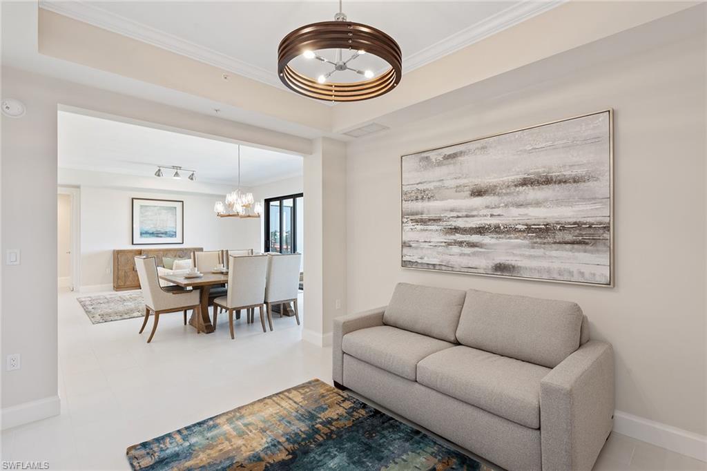 1111 Central Avenue, Unit 506 Naples, FL 34102 - Photo 14 of 21 a living room with furniture and a large window