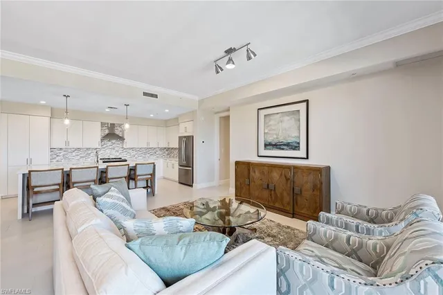 a living room with furniture and a couch