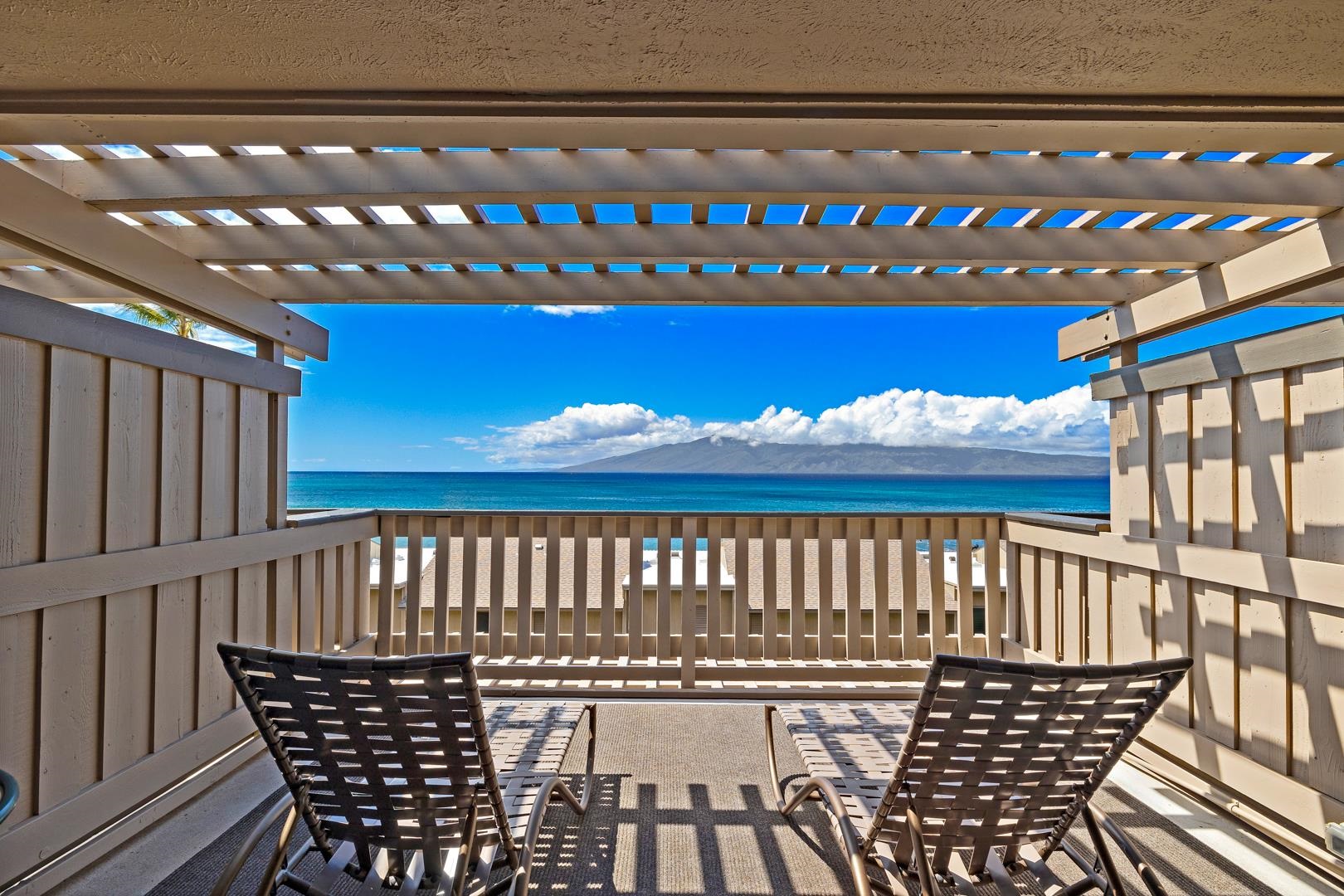 4909 Lower Honoapiilani Road, Unit E5 Lahaina, HI 96761 - Photo 13 of 28 a view of balcony with wooden floor