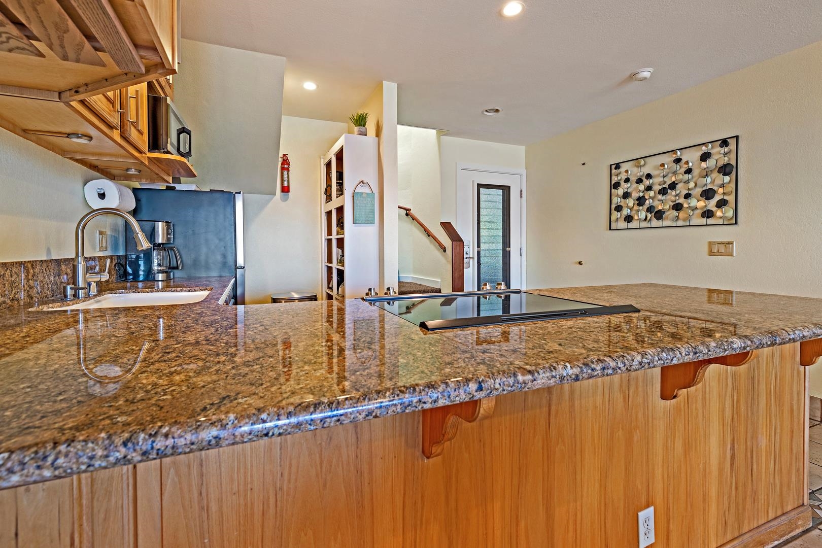 4909 Lower Honoapiilani Road, Unit E5 Lahaina, HI 96761 - Photo 17 of 28 a view of a kitchen with a sink