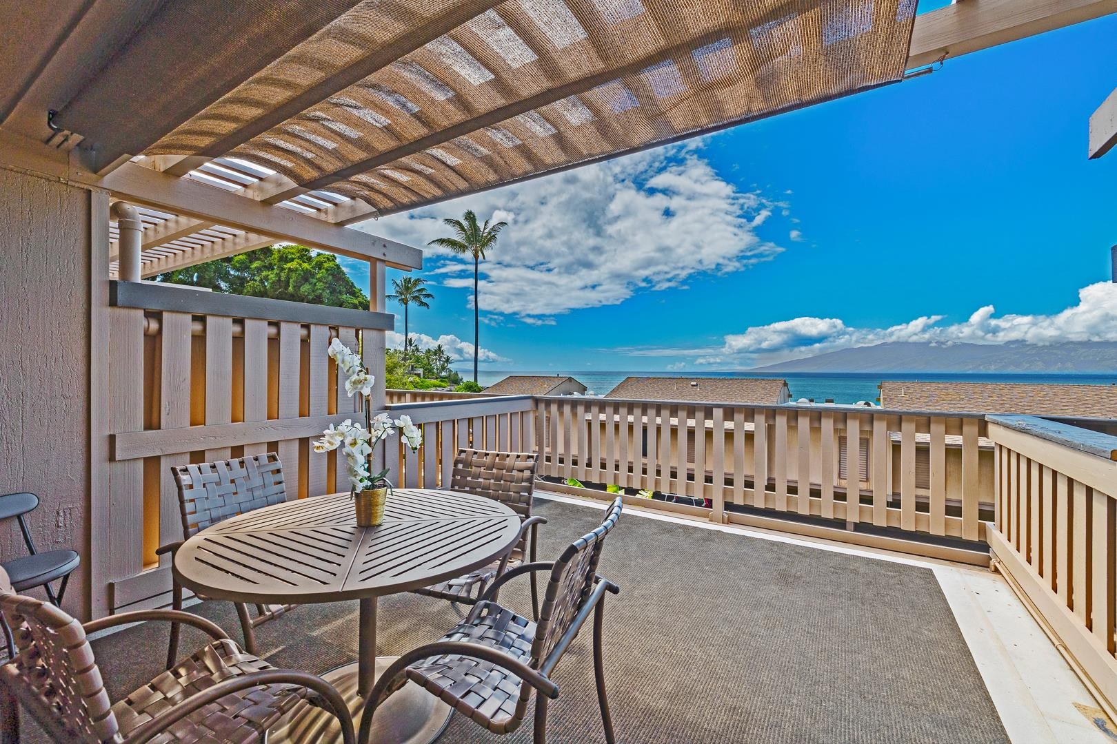 4909 Lower Honoapiilani Road, Unit E5 Lahaina, HI 96761 - Photo 2 of 28 a view of a balcony with furniture
