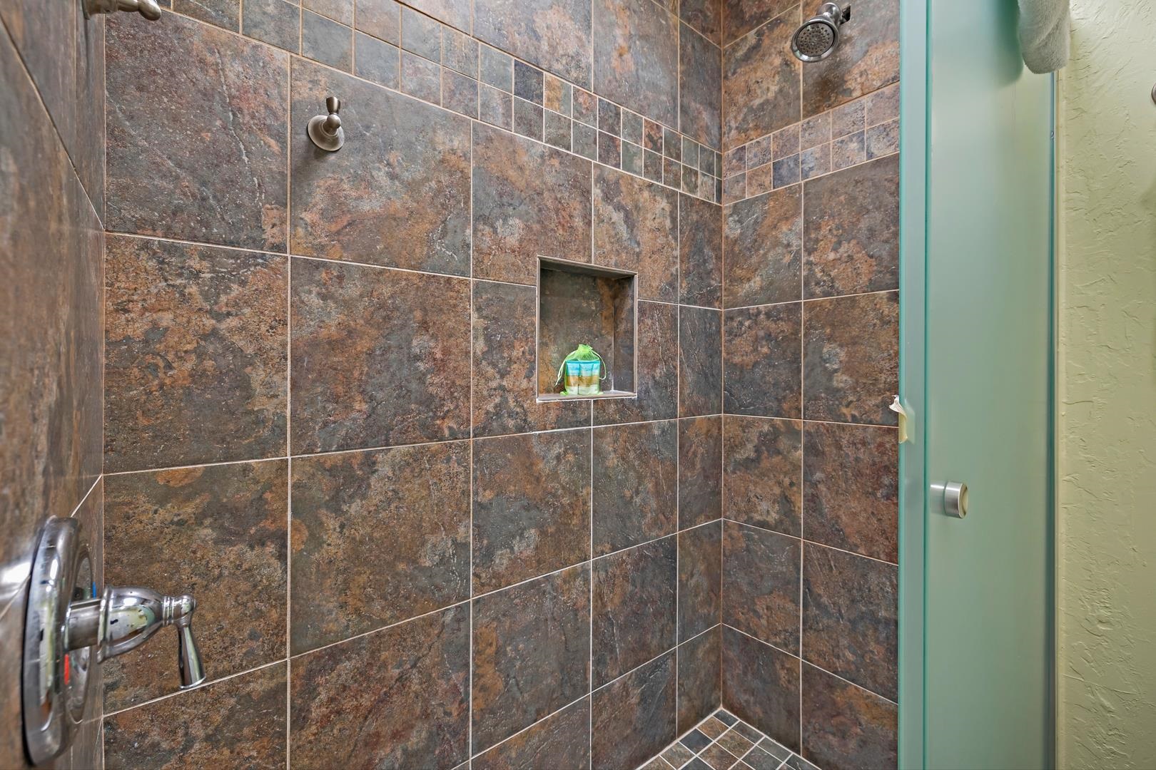 4909 Lower Honoapiilani Road, Unit E5 Lahaina, HI 96761 - Photo 26 of 28 a bathroom with a shower
